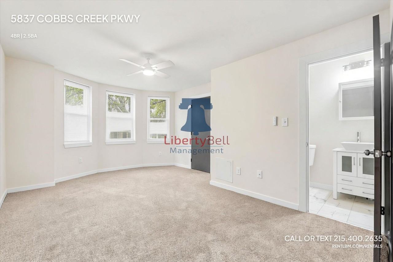 5837 Cobbs Creek Pkwy - Photo 5 of 19