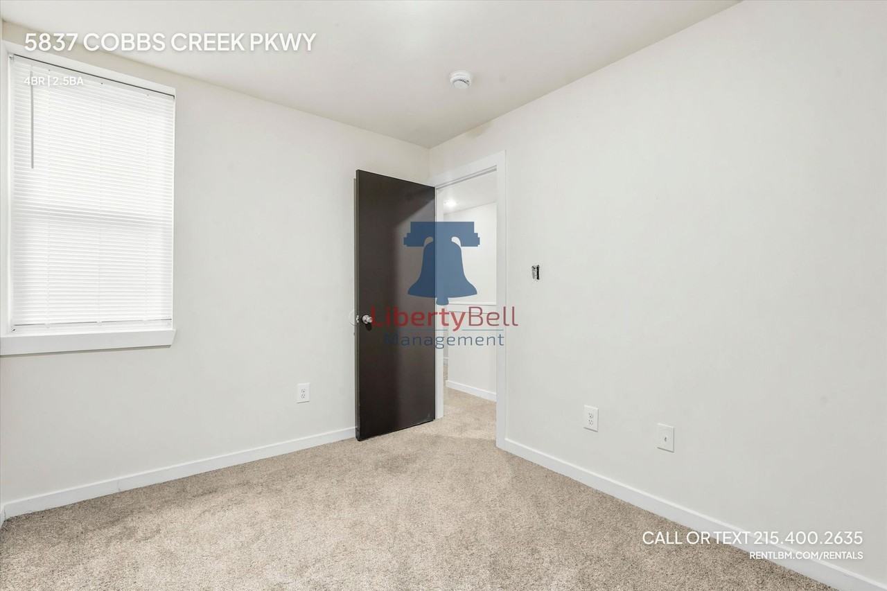 5837 Cobbs Creek Pkwy - Photo 7 of 19