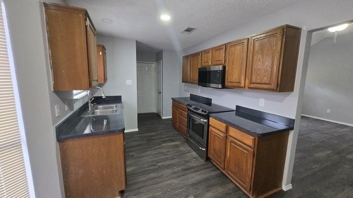 6909 Club Creek Dr - Photo 4 of 13