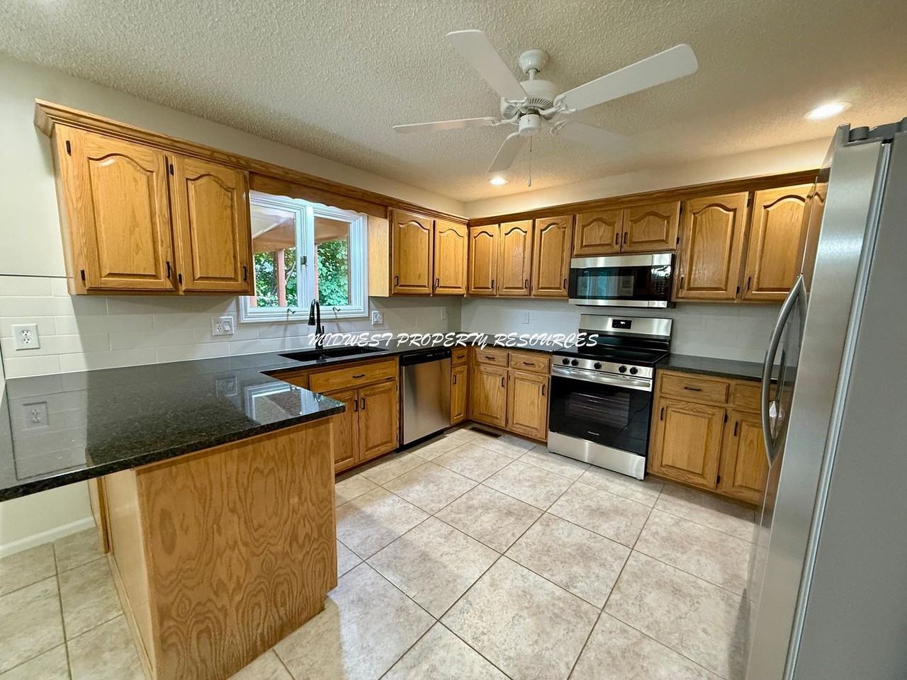 1629 Ne Whitestone Dr - Photo 4 of 31