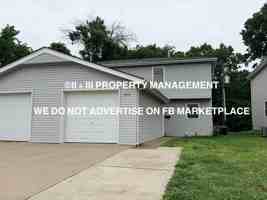 featured image of 7818 W 61st Ter #1