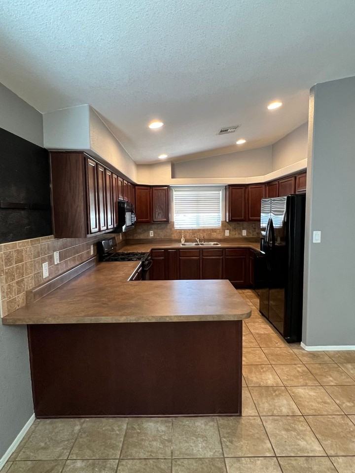 6565 E 33rd Ln - Photo 6 of 26