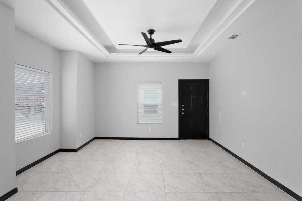 1308 S Xanthia St Apt 4 - Photo 2 of 9