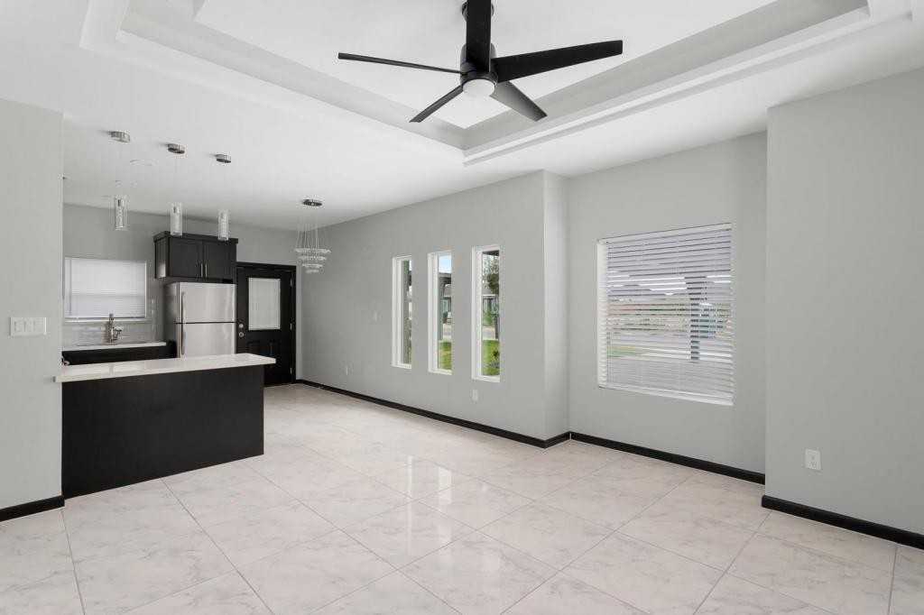 1308 S Xanthia St Apt 4 - Photo 3 of 9