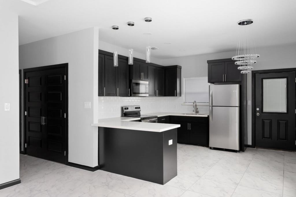 1308 S Xanthia St Apt 4 - Photo 4 of 9