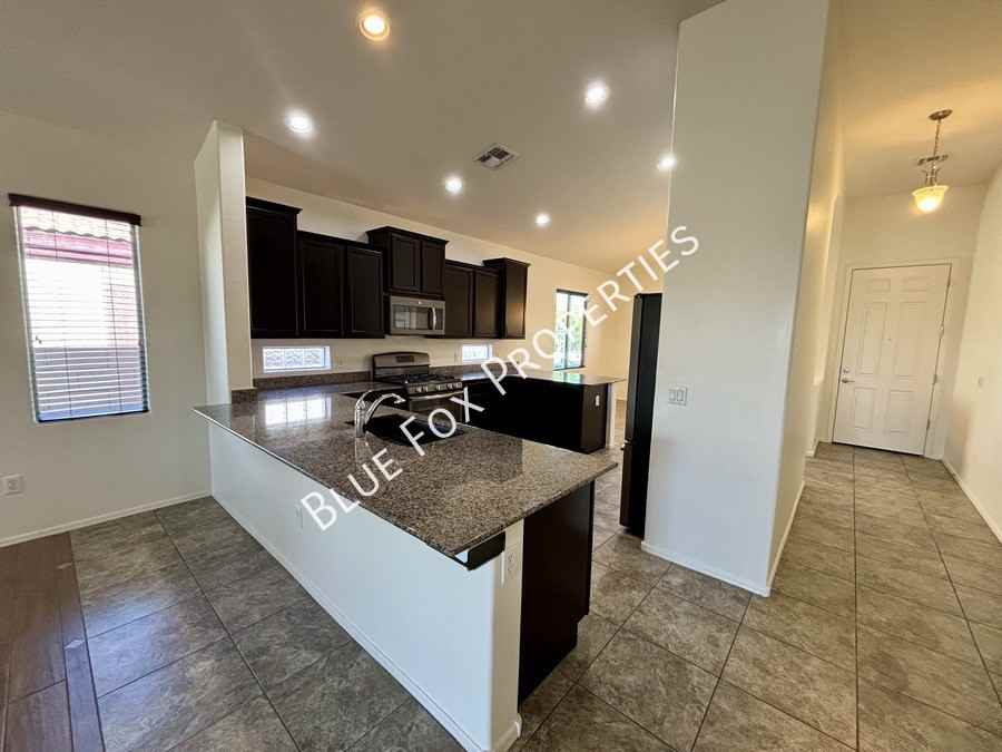 9906 N Niobrara Way - Photo 4 of 25