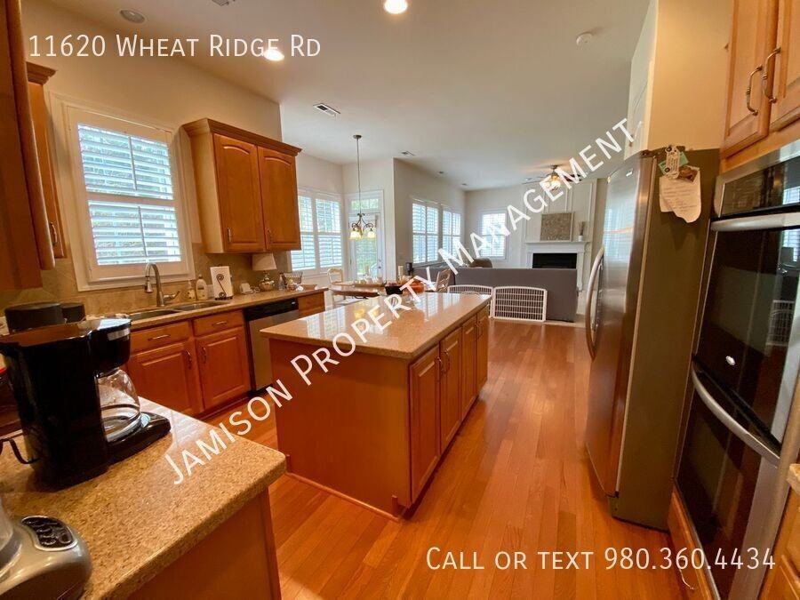 11620 Wheat Ridge Rd - Photo 7 of 30
