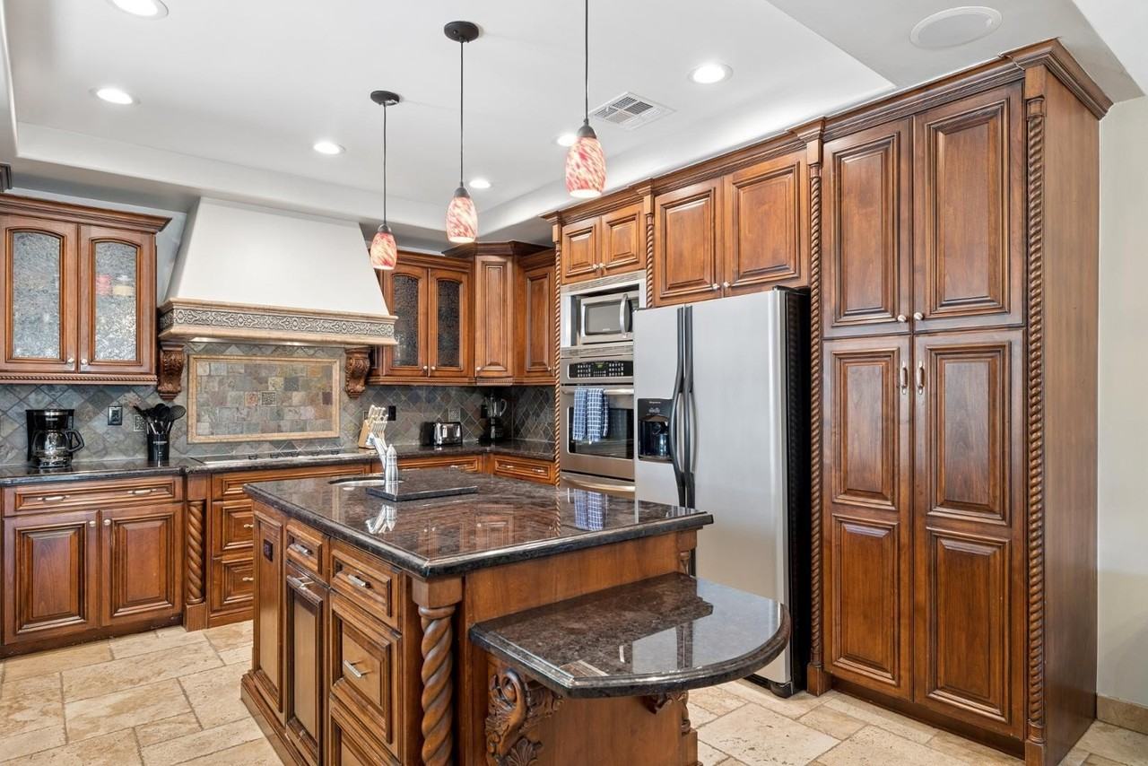 9023 W Patrick Ln - Photo 4 of 40