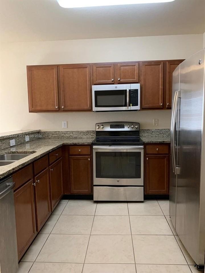 8930 Nw 97th Ave #209 - Photo 3 of 31