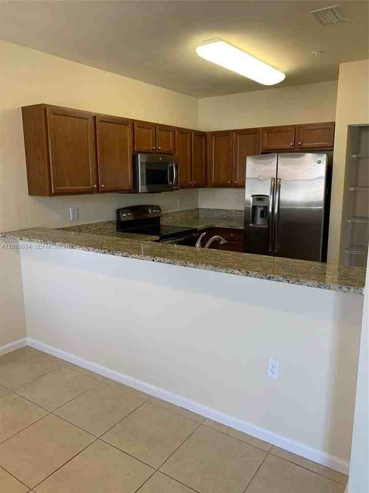 8930 Nw 97th Ave #209 - Photo 5 of 31