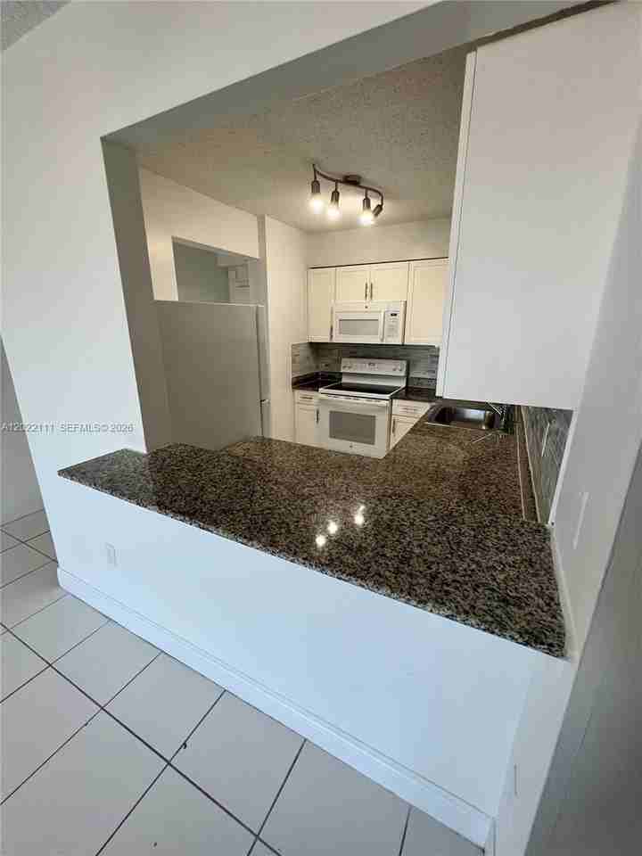 9591 Fontainebleau Blvd #514 - Photo 6 of 10