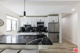 9024 Phyllis Ave #A - Photo 5 of 8