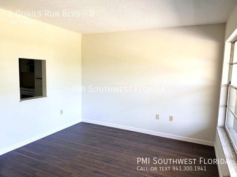 2 Quails Run Blvd #8 - Photo 2 of 11