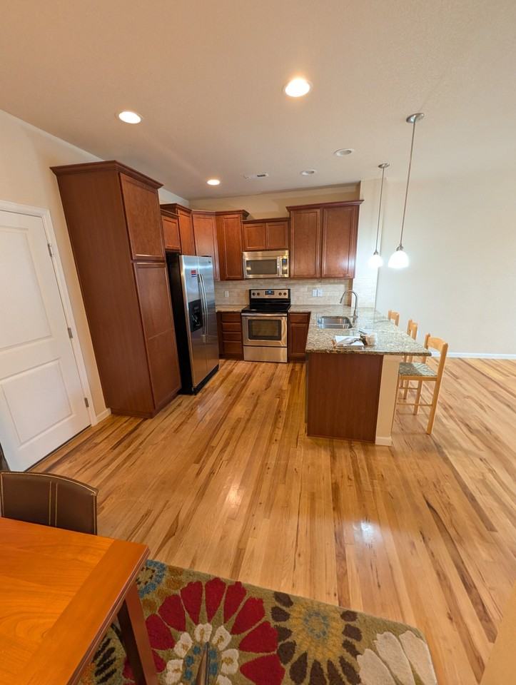 15952 W 63rd Ln #D - Photo 4 of 13