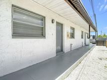 65th Terrace N - Triplex - Photo 1 of 1