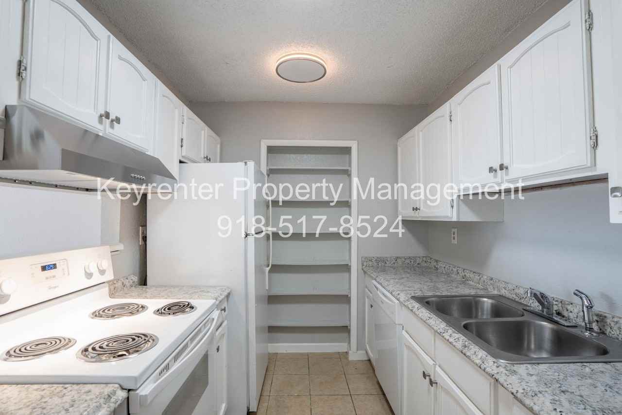 1448 S 108th East Pl - Photo 7 of 16