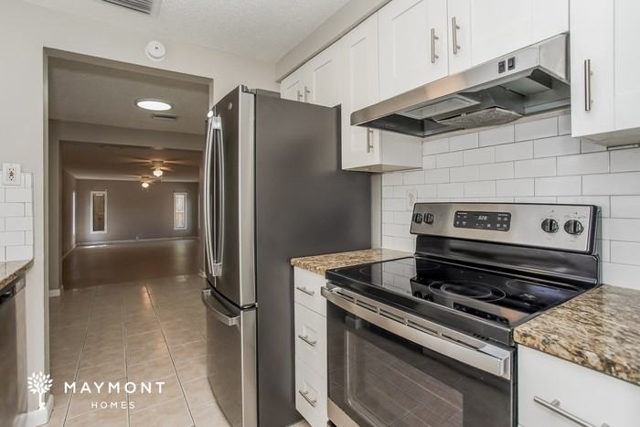 5577 89th Ave N - Photo 7 of 15