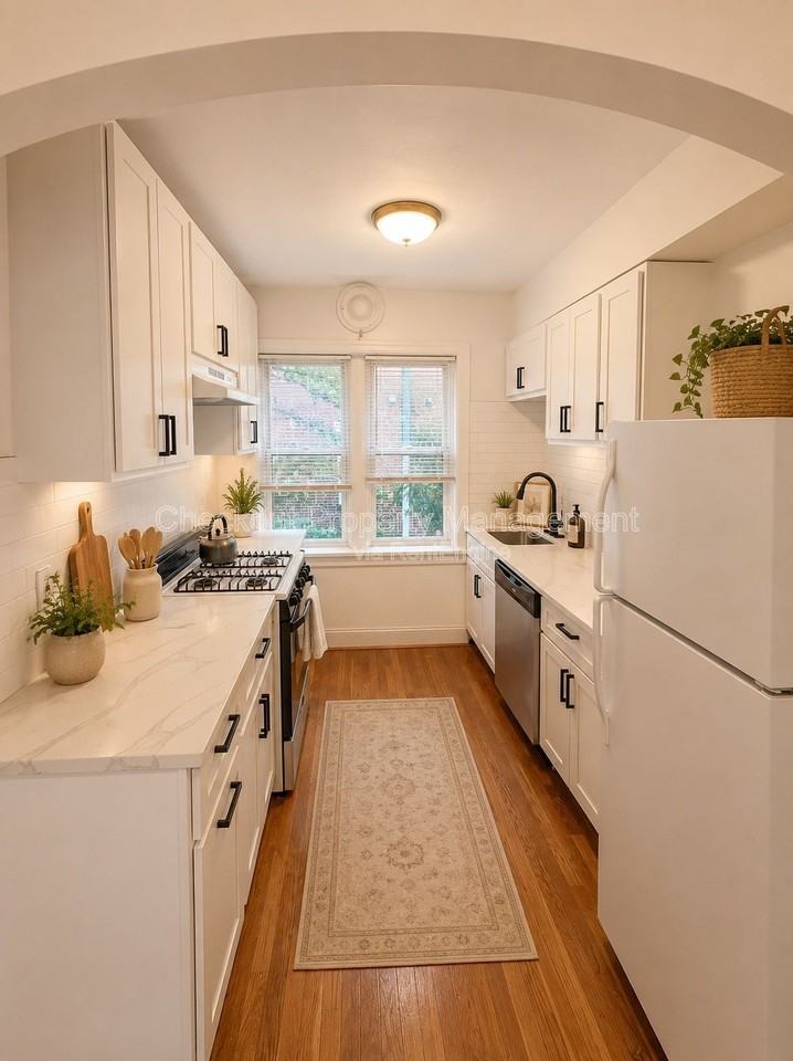 7334 Forsyth Blvd #202 - Photo 2 of 10