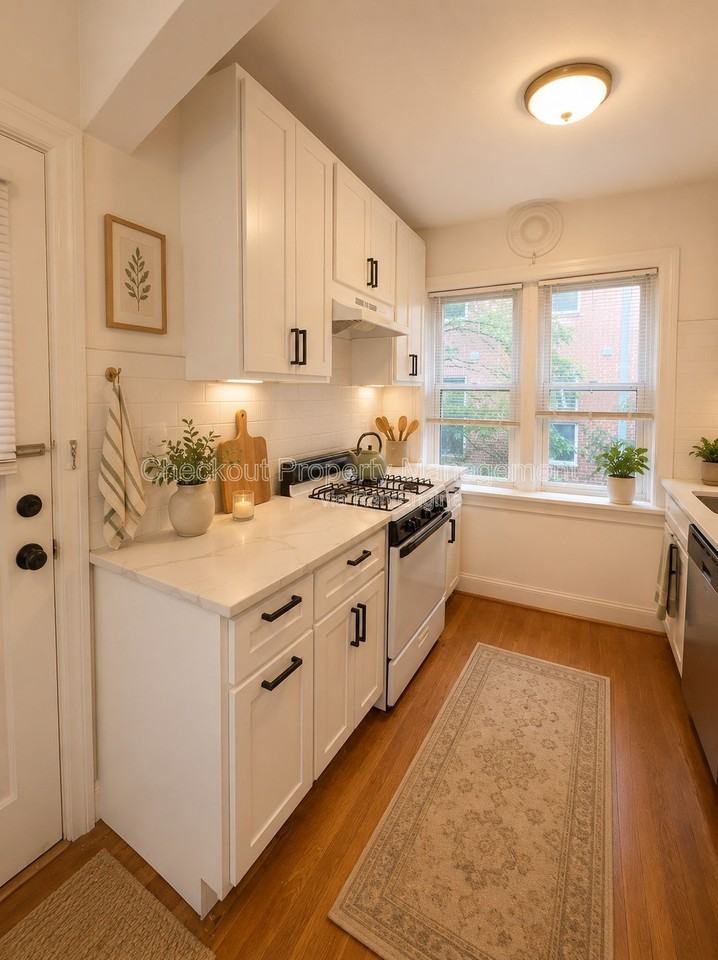 7334 Forsyth Blvd #202 - Photo 3 of 10