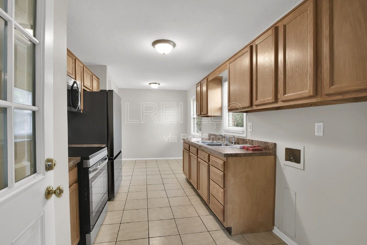 6701 Barfield Rd - Photo 4 of 13