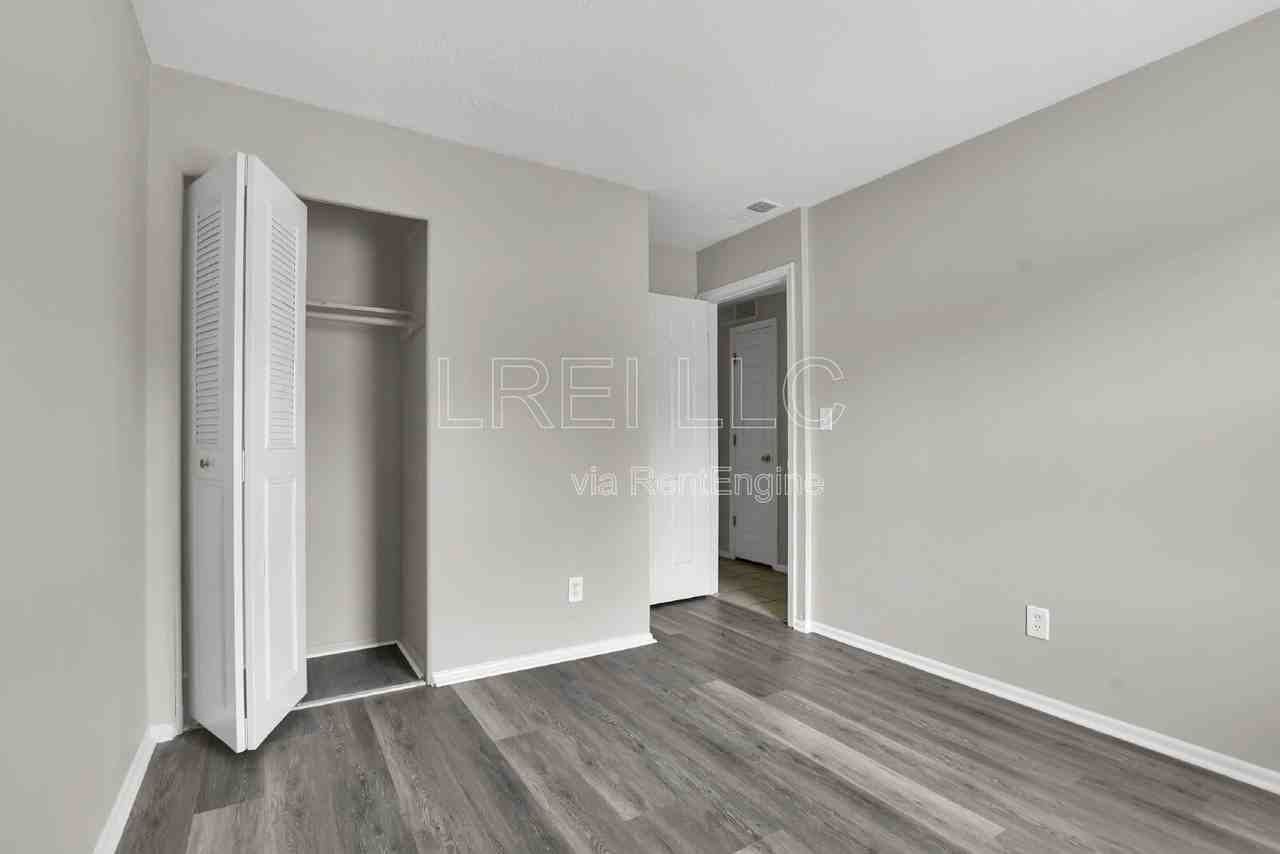 6701 Barfield Rd - Photo 7 of 13