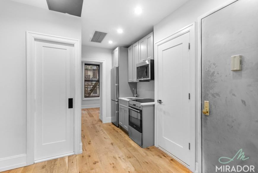 221 E 10th St - Photo 2 of 10