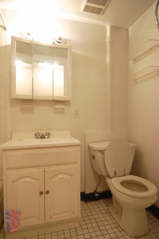 411 E 12th St - Photo 3 of 5