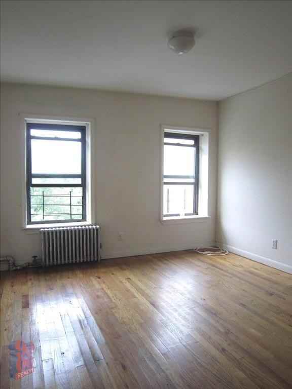411 E 12th St - Photo 5 of 5