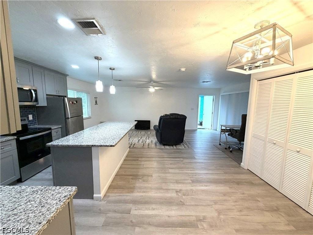 3032 Se Santa Barbara Pl #2 - Photo 4 of 16