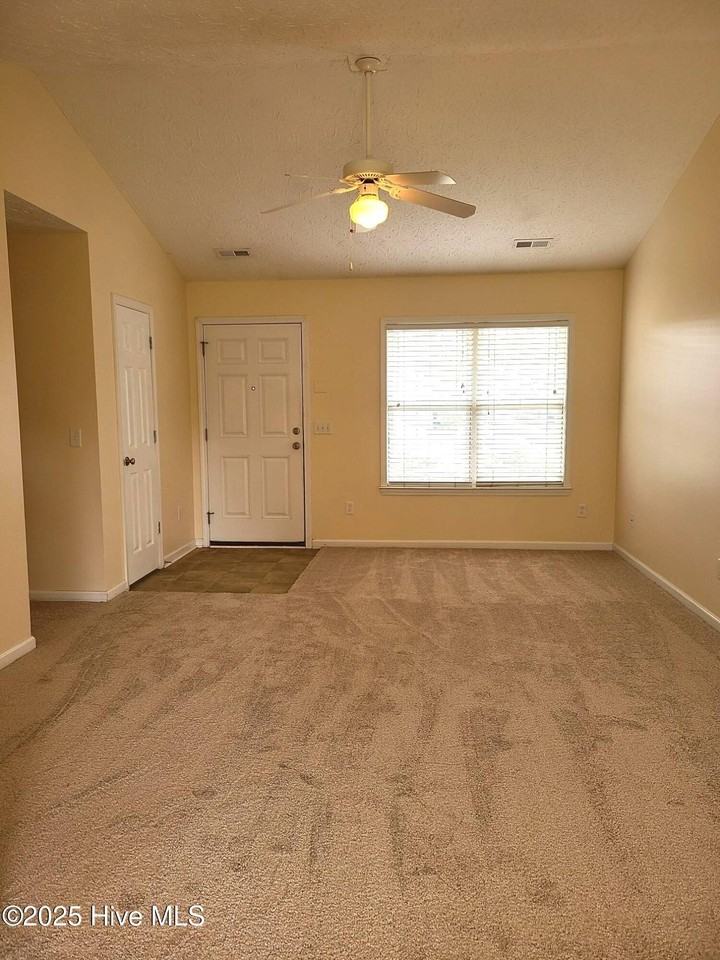 9499 Huckabee Dr Ne - Photo 2 of 10