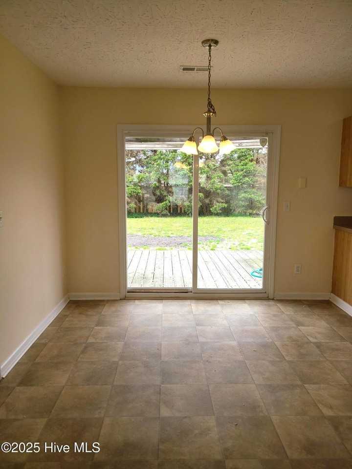 9499 Huckabee Dr Ne - Photo 3 of 10