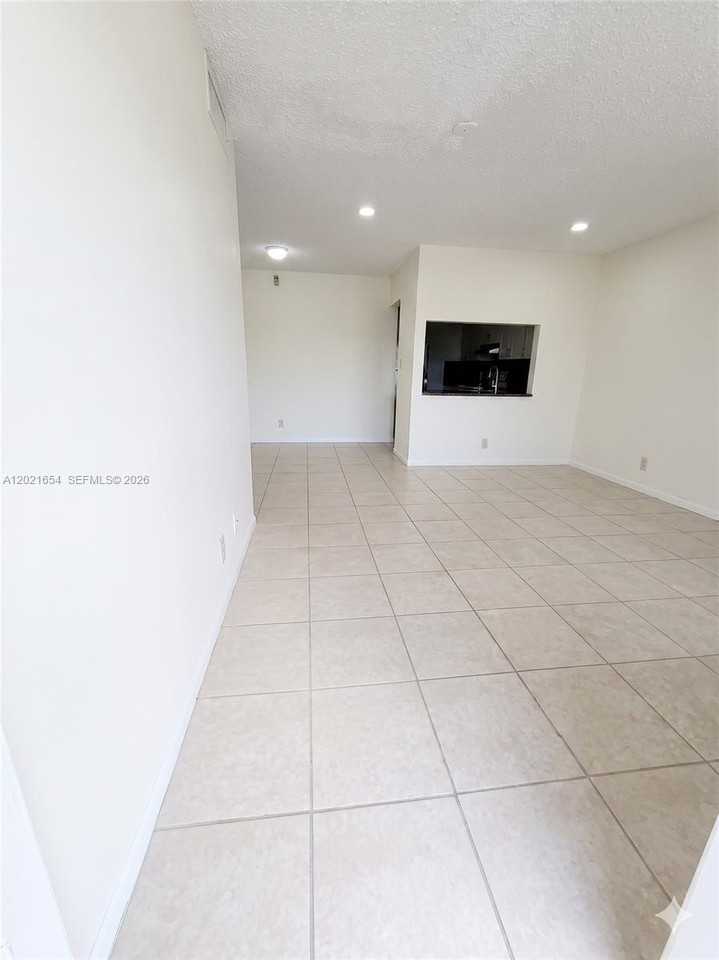 10038 Winding Lake Rd #204 - Photo 4 of 9
