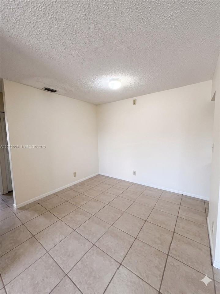 10038 Winding Lake Rd #204 - Photo 5 of 9