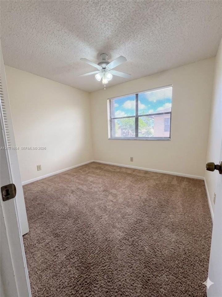 10038 Winding Lake Rd #204 - Photo 7 of 9