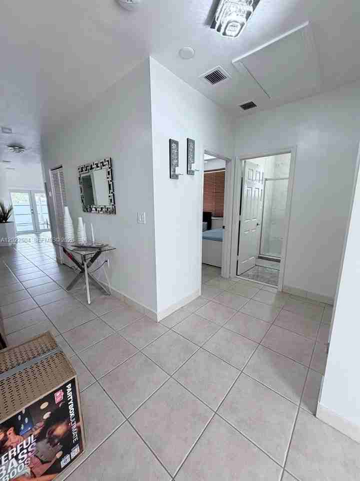 1670 Nw 73rd St - Photo 4 of 23