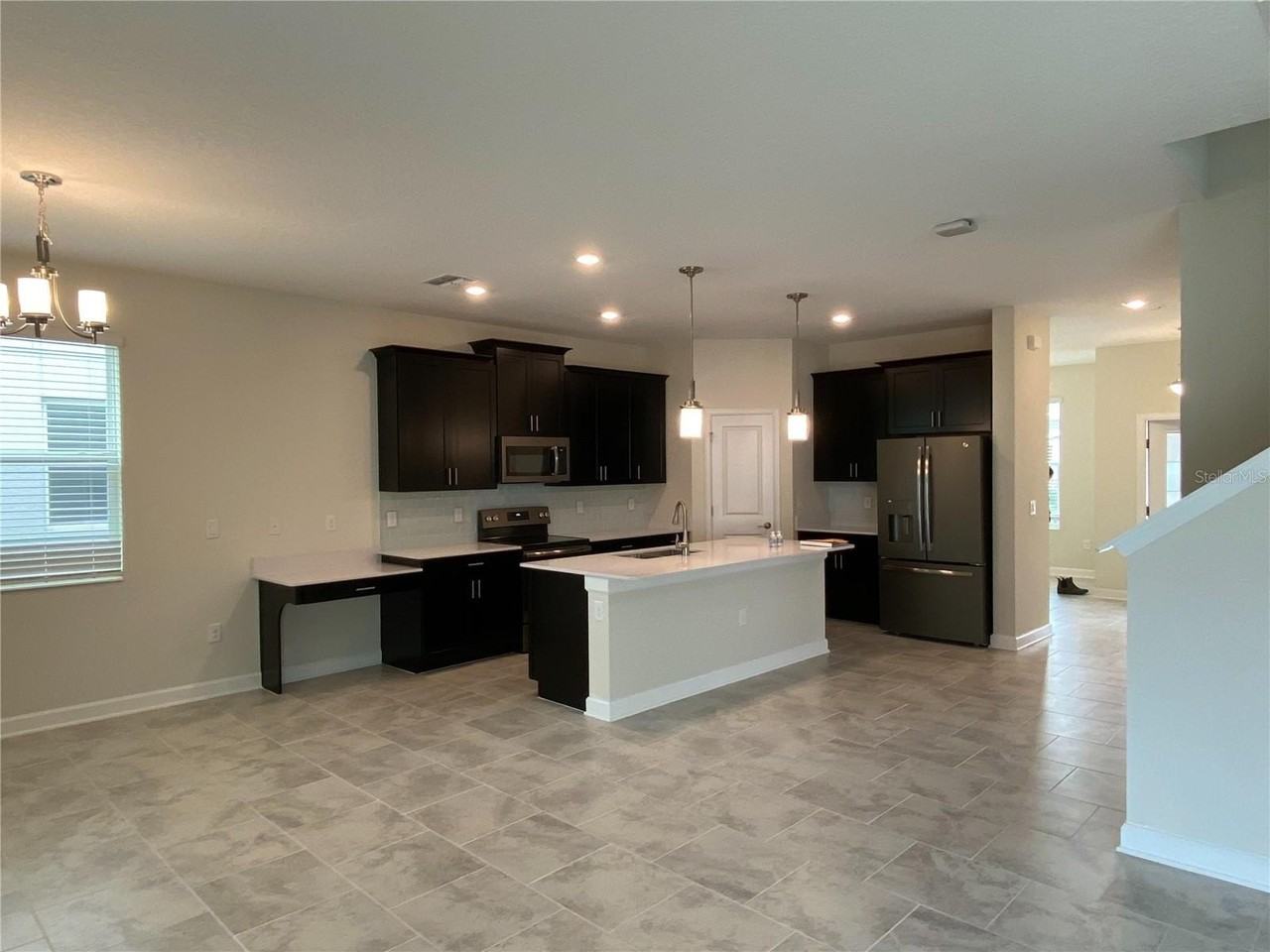 11973 Hometown Pl - Photo 3 of 13