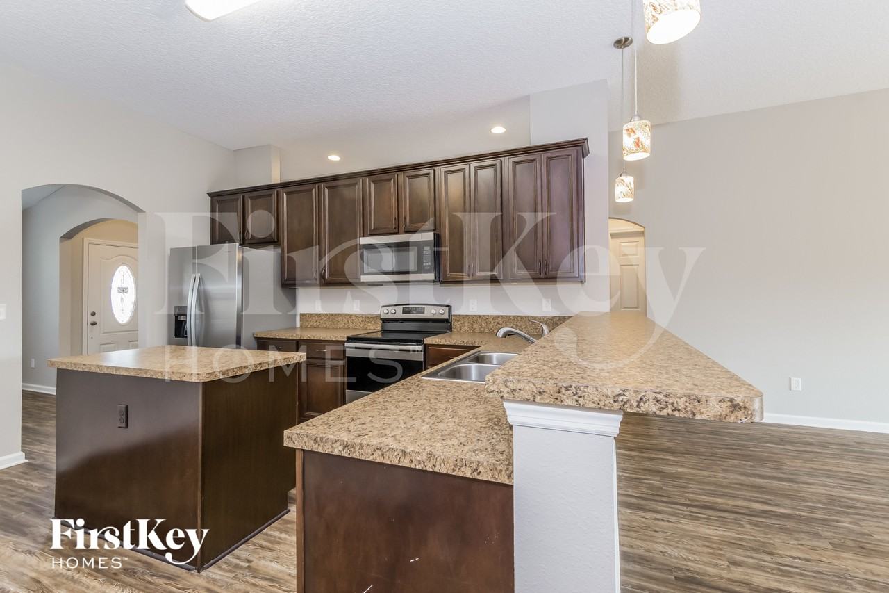 9760 Woodstone Mill Dr - Photo 6 of 15