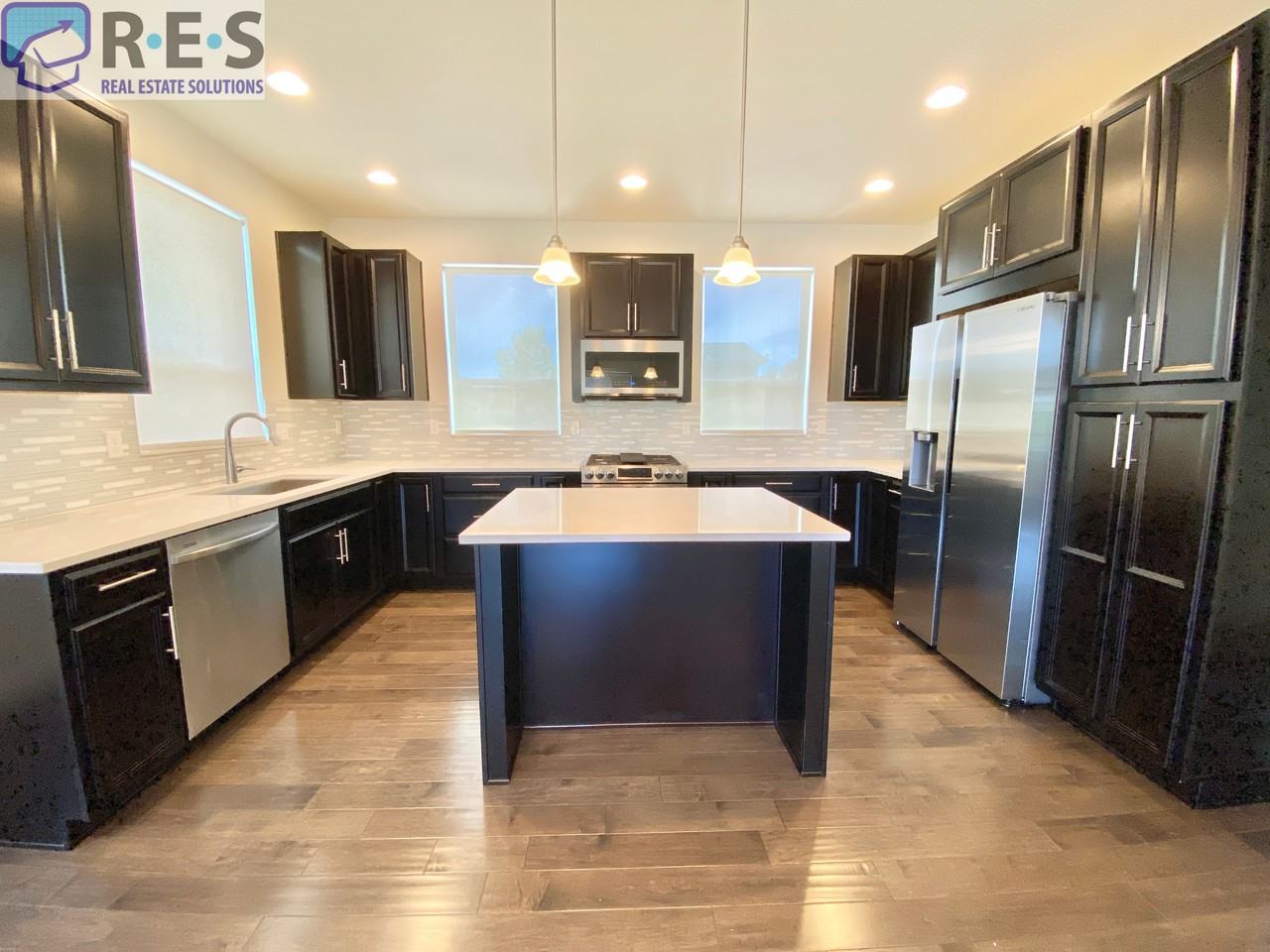 9190 E 52nd Dr - Photo 3 of 11