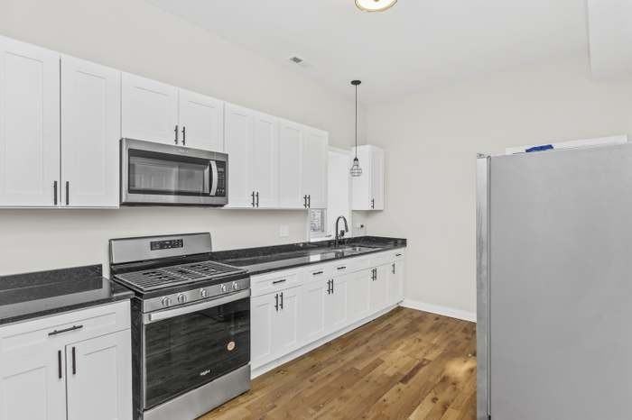 6348 S Langley Ave #1 - Photo 2 of 12