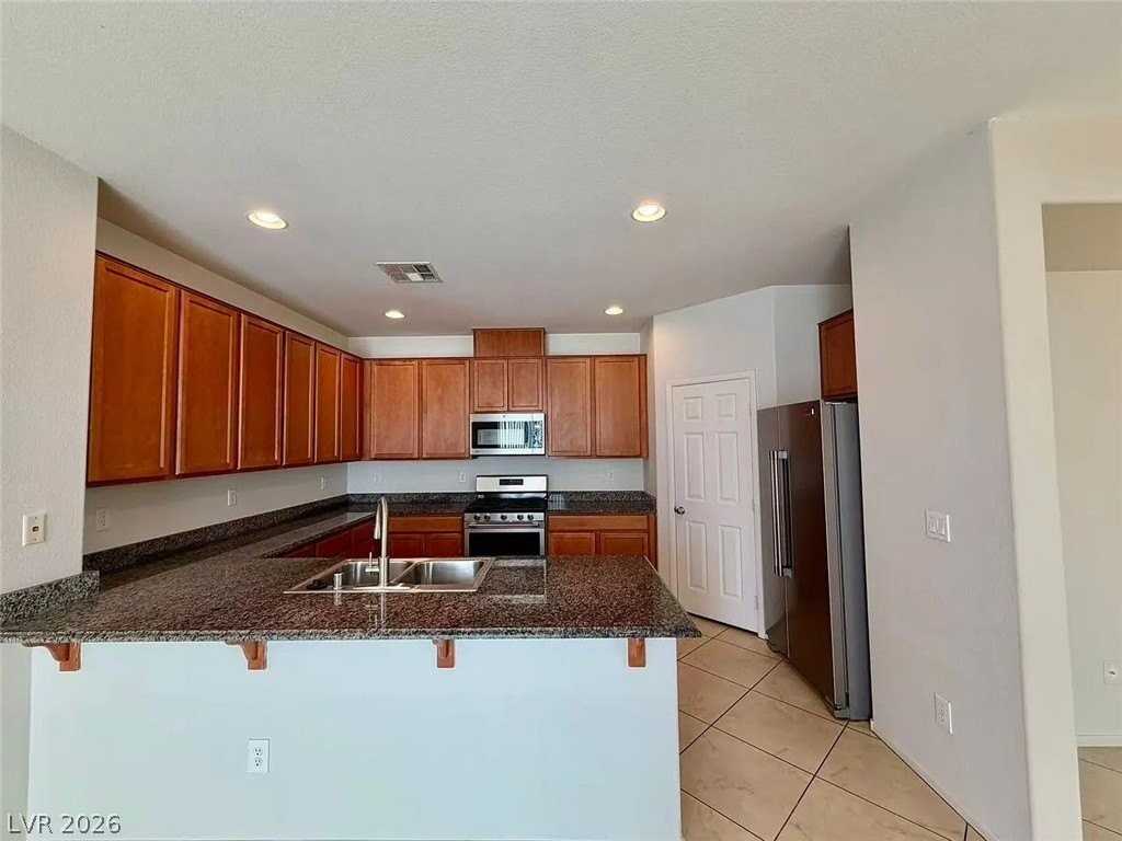 8626 Rowland Bluff Ave - Photo 6 of 25