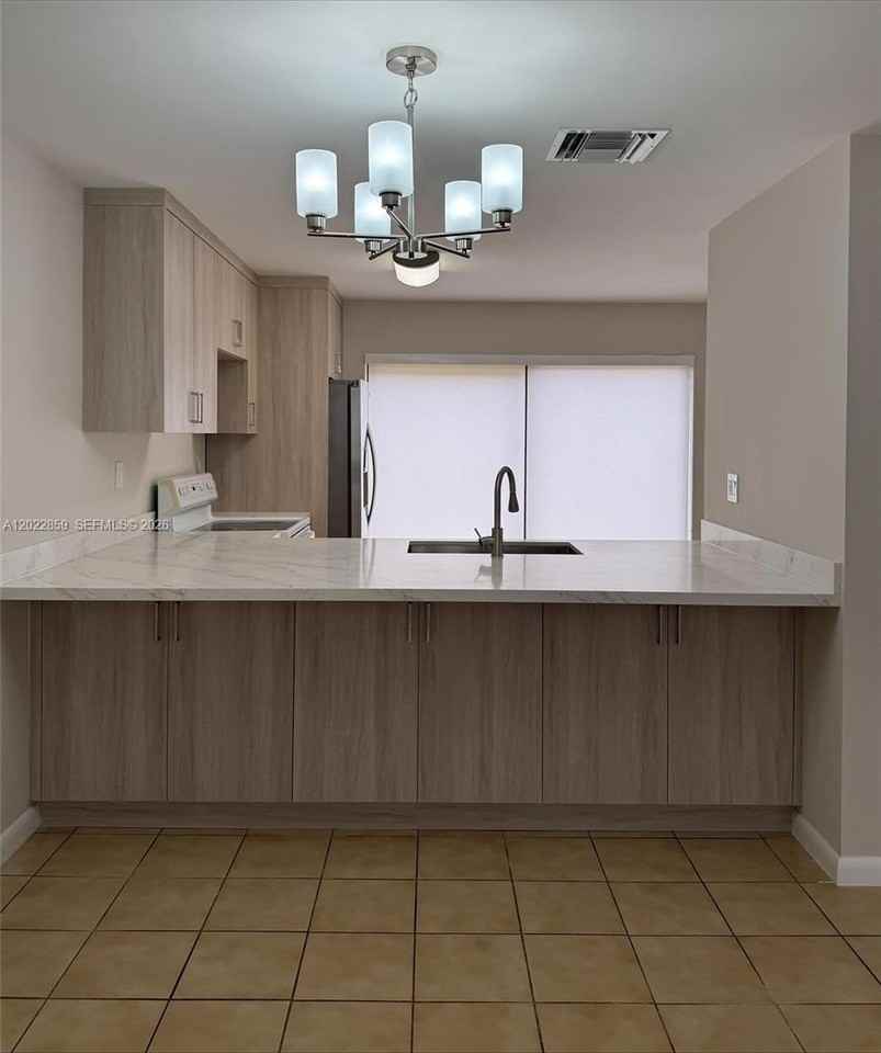10904 Nw 7th St #203 - Photo 4 of 15