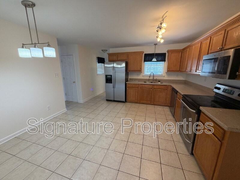 1609 Cadmus Ct - Photo 5 of 32