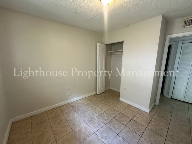1490 W 33rd St - Photo 3 of 16