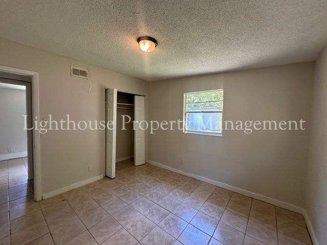 1490 W 33rd St - Photo 4 of 16
