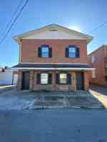 featured image of 103 W 6th St