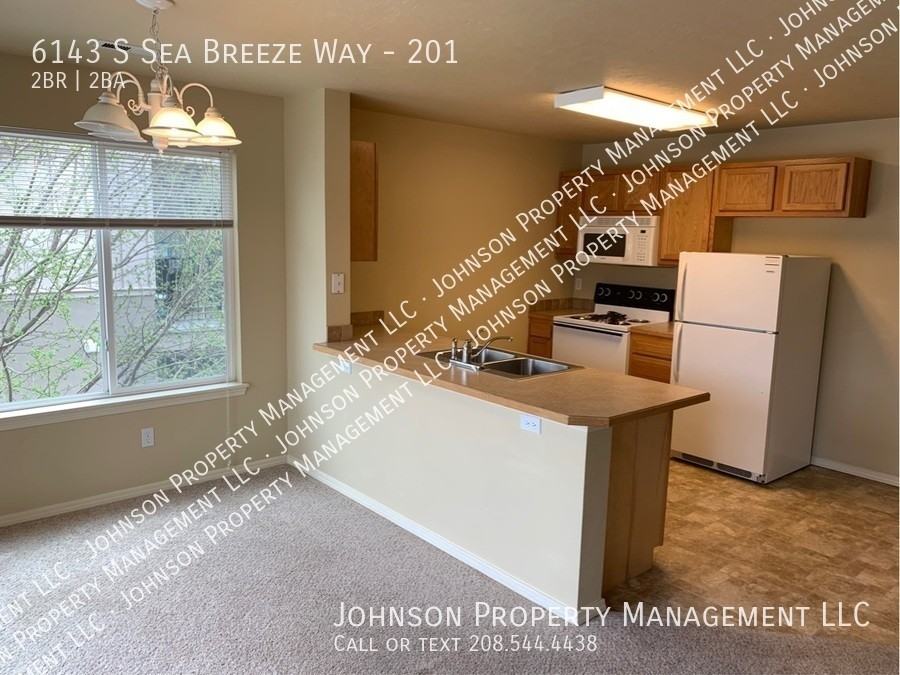 6143 S Sea Breeze Way #201 - Photo 4 of 17