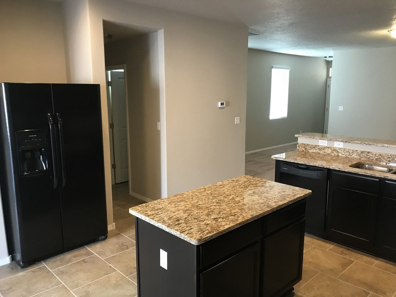 8909 Warm Wind Pl Nw - Photo 4 of 7