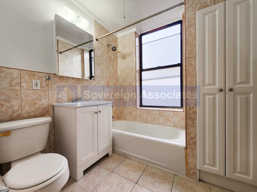 169 E 102nd St - Photo 2 of 4