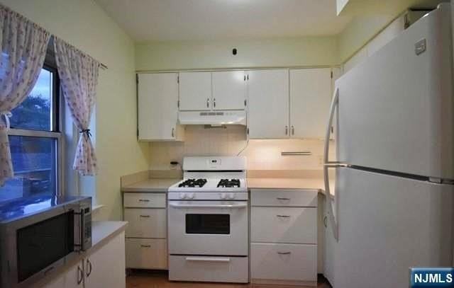 1565 Center Ave #2F - Photo 6 of 13