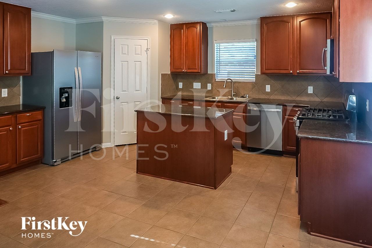 21919 Whispering Daisy Ct - Photo 5 of 16